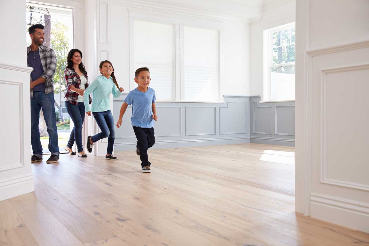 Happy family moving into new custom home in Vero Beach FL