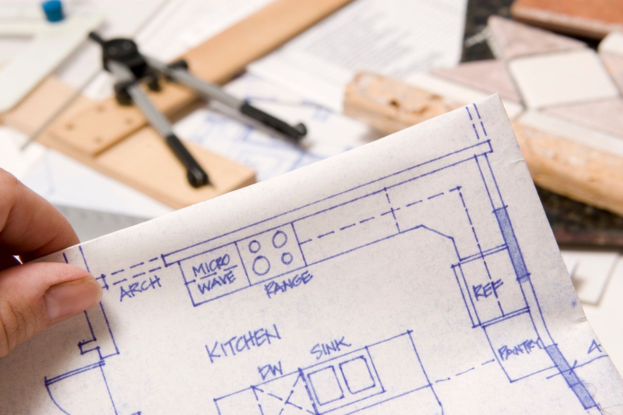 Custom kitchen remodel blueprint showing layout of cabinets, appliances, and counters.