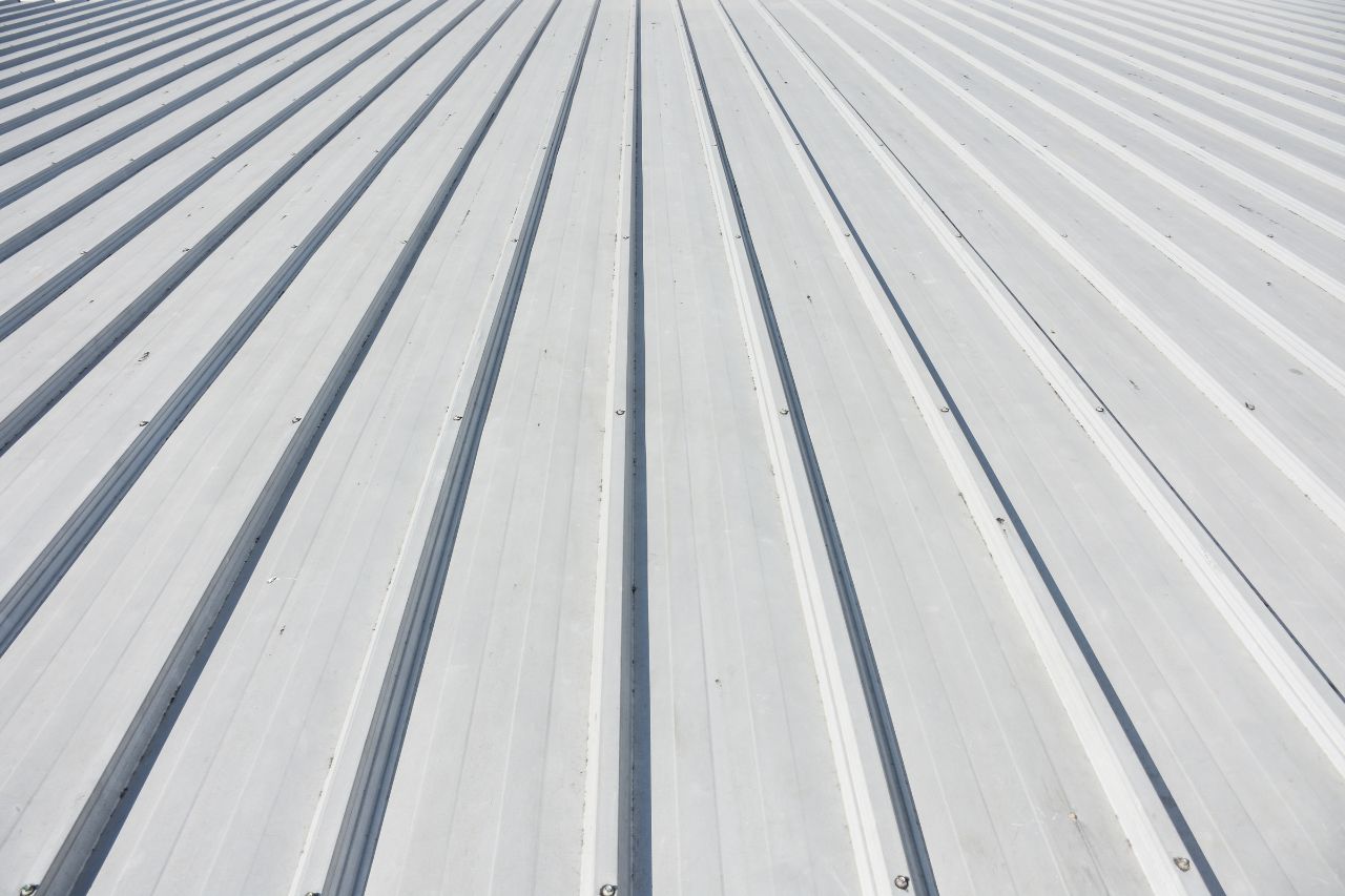 Close-up of new metal roof panels installed by ERS Construction in Treasure Coast Florida