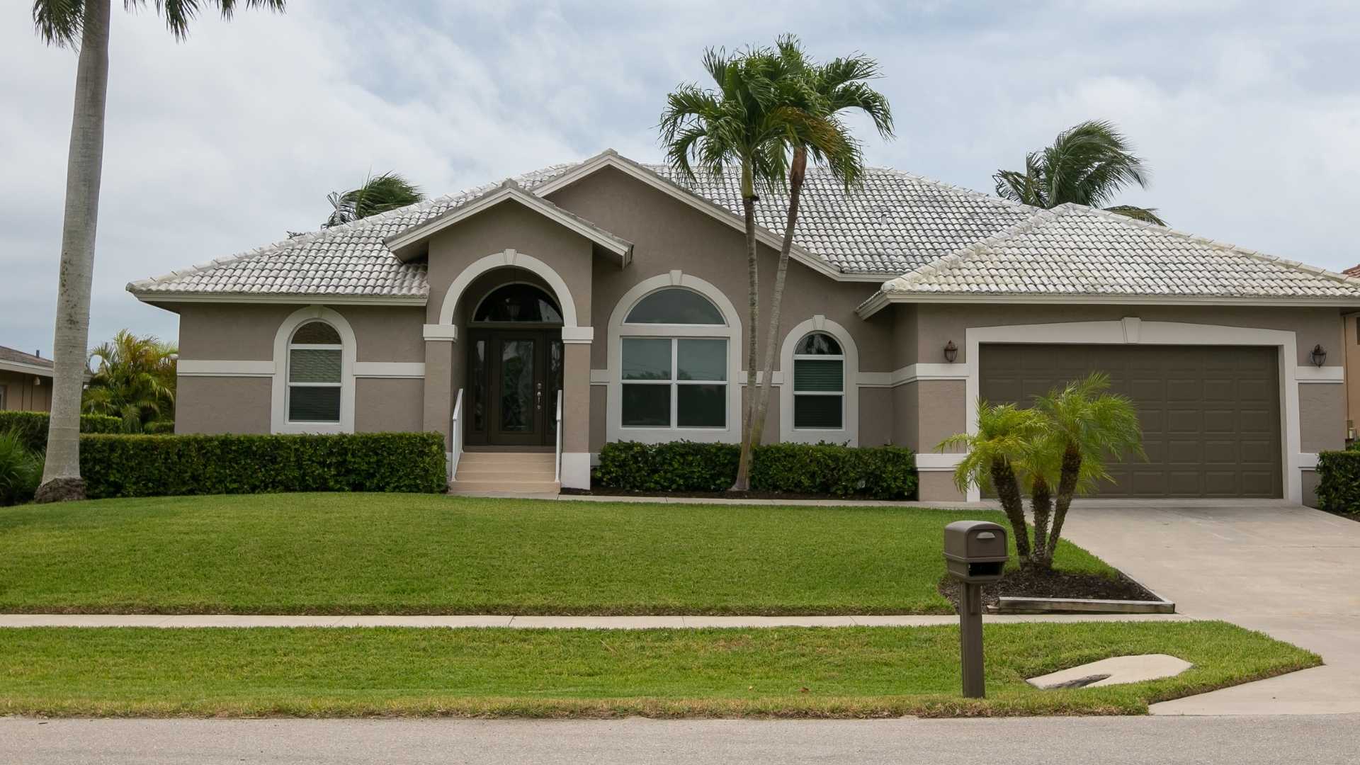 Florida home with shingle roof at sunset in the Treasure Coast area